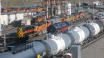 GATX 209902, 209905, TGAX 131486, RDG 2100 + BNSF Engines